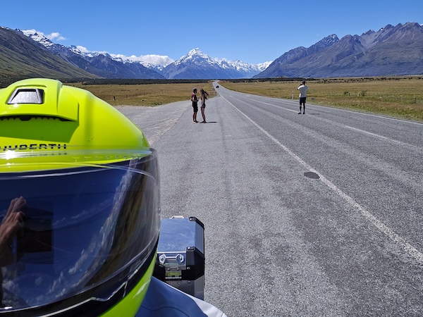 Motorcyclist selfie looking back at Mt Cook