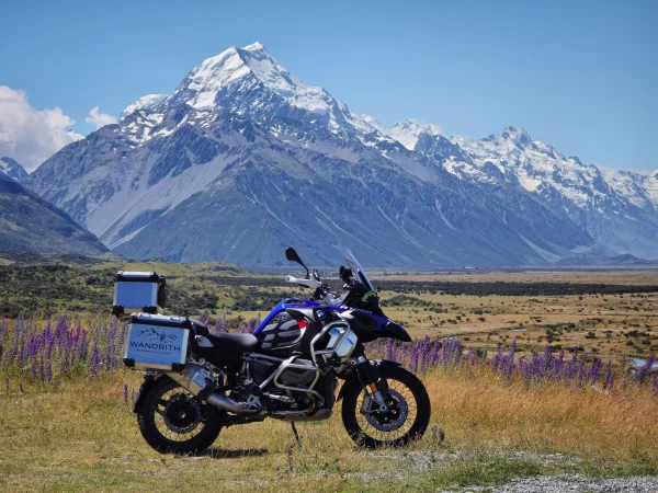 Motorcyclist selfie looking back at Mt Cook