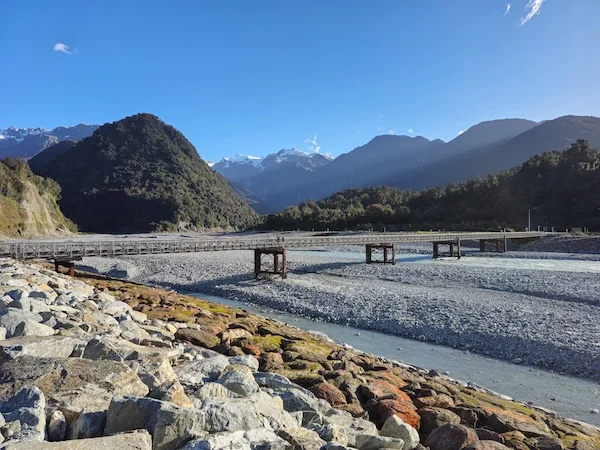 South Island road bridge crossing a stony river